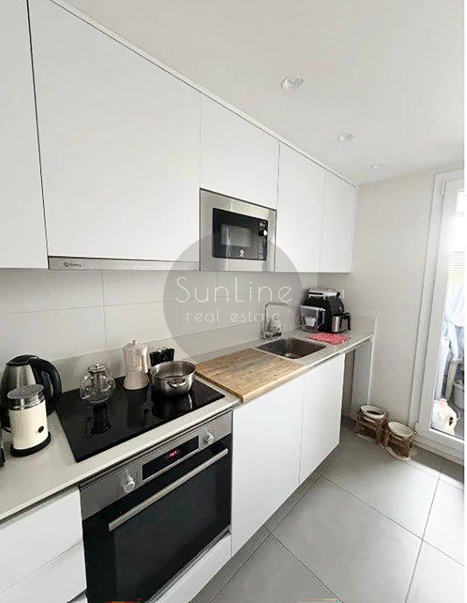 Renting a stylish apartment with a terrace, pool, and garage in Malilla