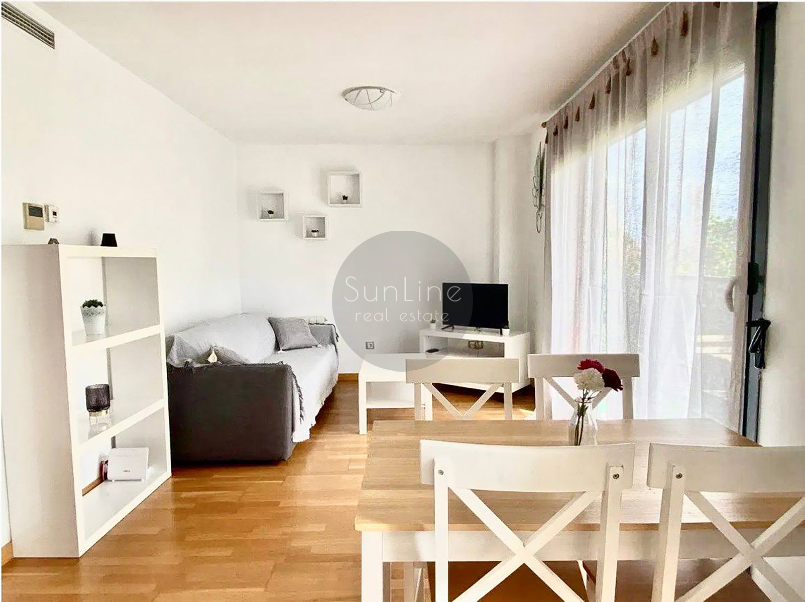 Rent of a contemporary apartment with a pool, garden, and garage in Campanare