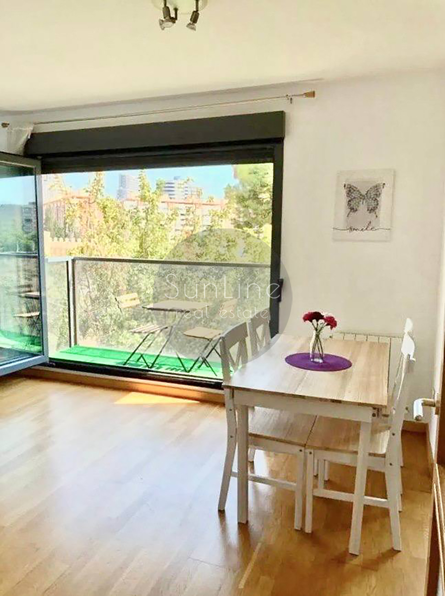 Rent of a contemporary apartment with a pool, garden, and garage in Campanare