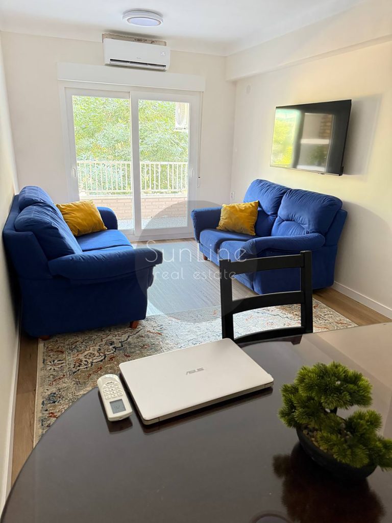 Rent of a furnished two-bedroom apartment with a balcony and park view