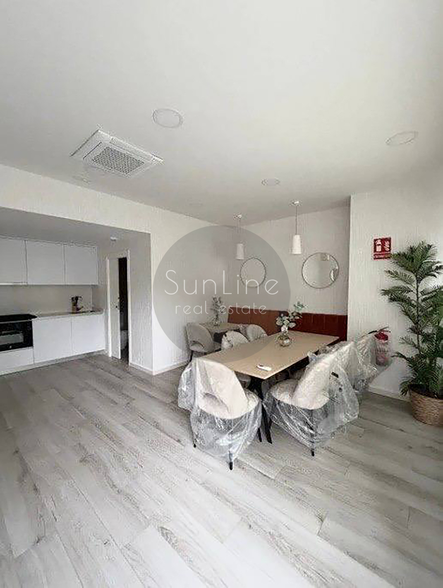 Renting a stylish apartment with a terrace, pool, and garage in Malilla