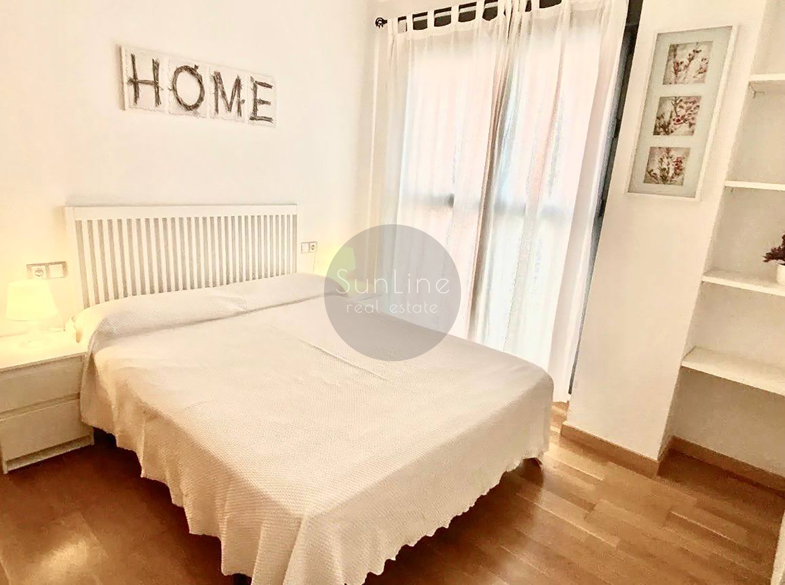 Rent of a contemporary apartment with a pool, garden, and garage in Campanare