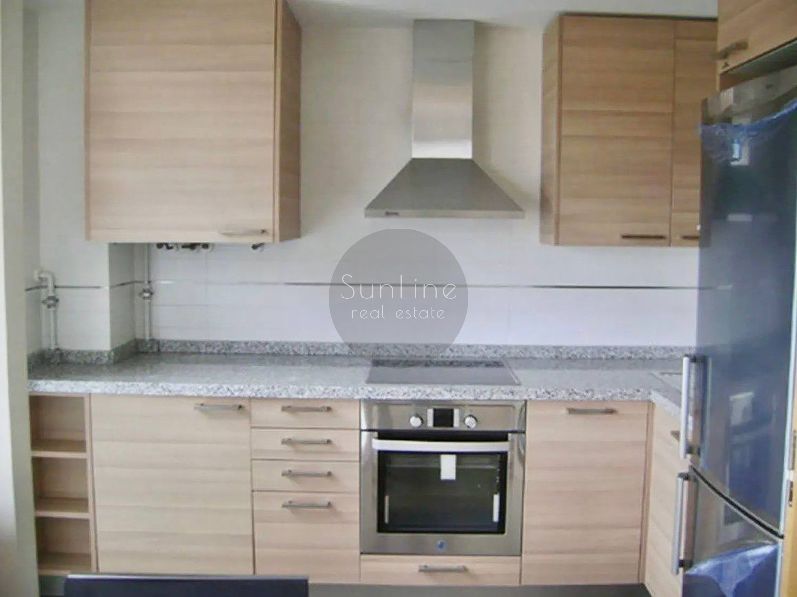 Rent of a contemporary apartment with a pool, garden, and garage in Campanare