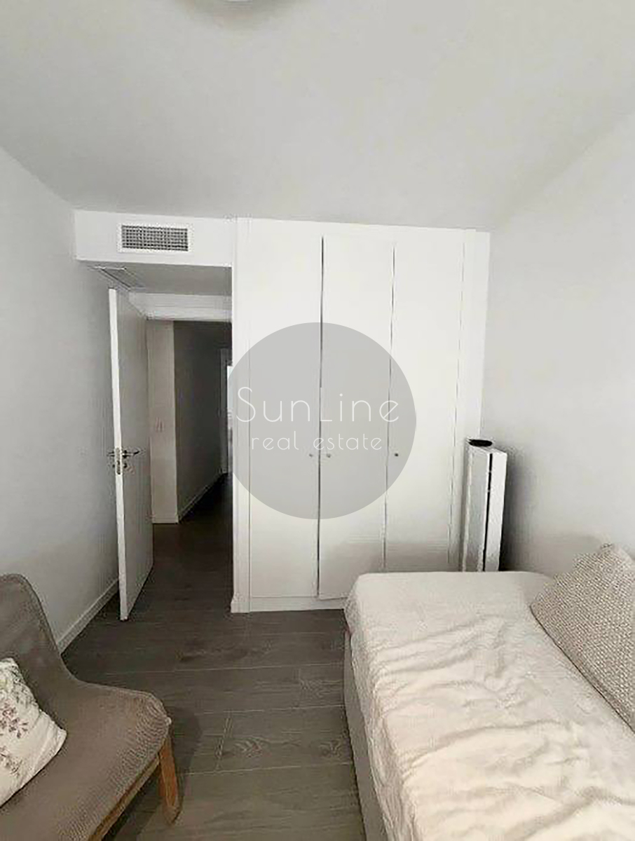 Renting a stylish apartment with a terrace, pool, and garage in Malilla