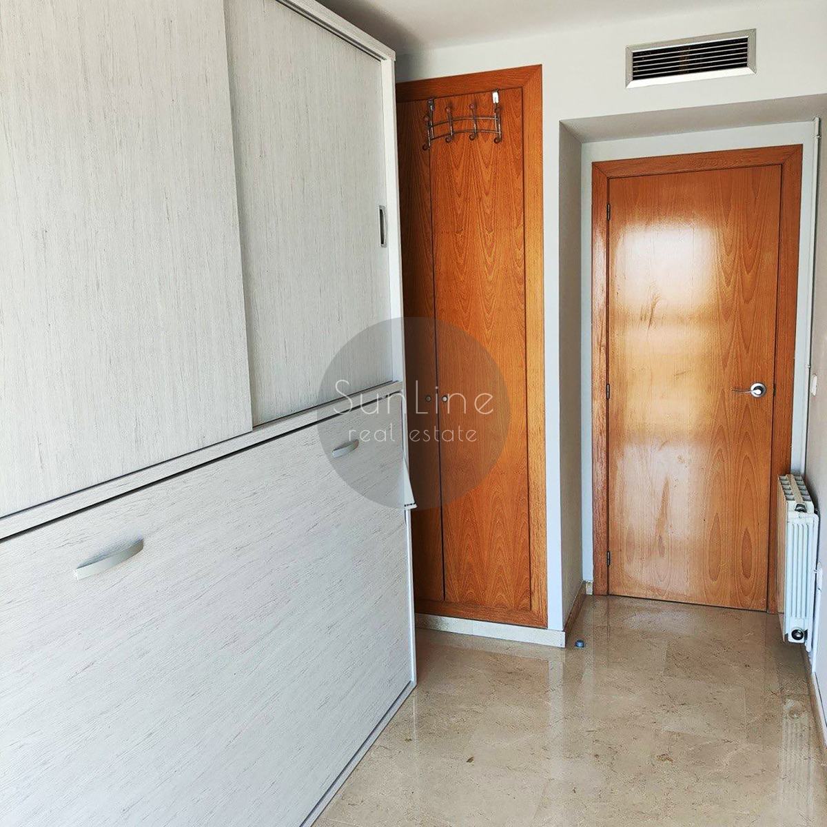 Arriendo de apartamento con 2 dormitorios, garaje y gran terraza en Benicalap
