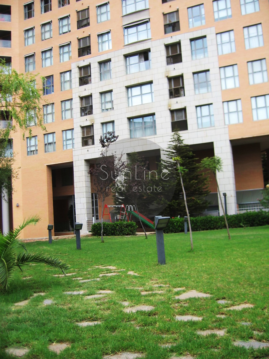 Spacious 116 m² apartment with pool, garden, and parking