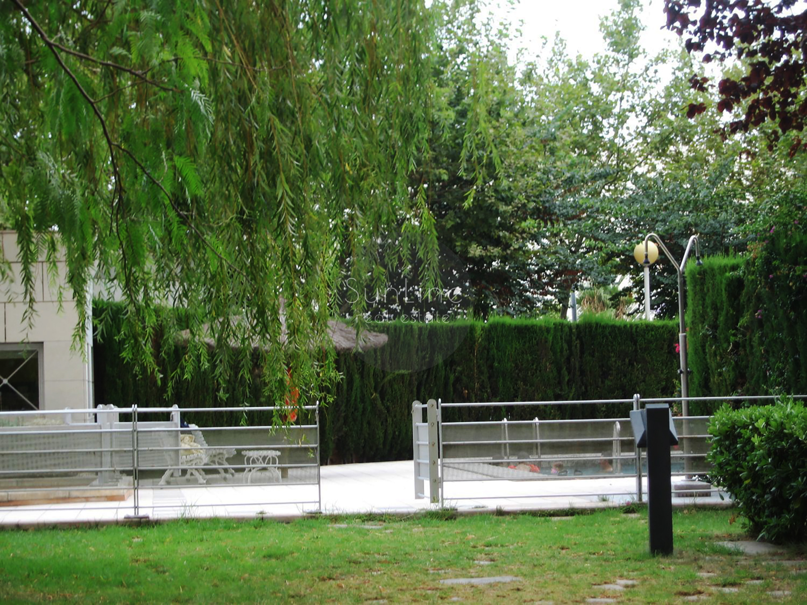 Spacious 116 m² apartment with pool, garden, and parking